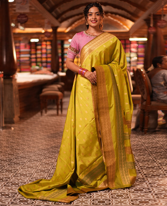 Parrot Green Fancy Raw Silk Saree, Subtly Woven with Buttas, Peacock-Flower Traditional Border, and a Matching Blouse