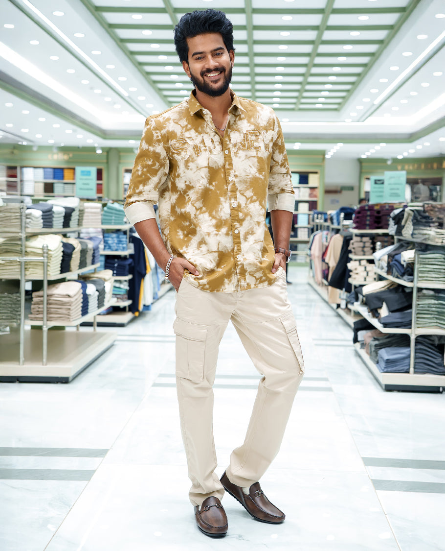 Khaki Cotton Blended Casual Shirt, Delicately Designed with Acid-Washed and Typography Patch Embroidery on the Chest, Featuring a Spread Collar, Full Sleeves, Slim Fit, and Regular Length