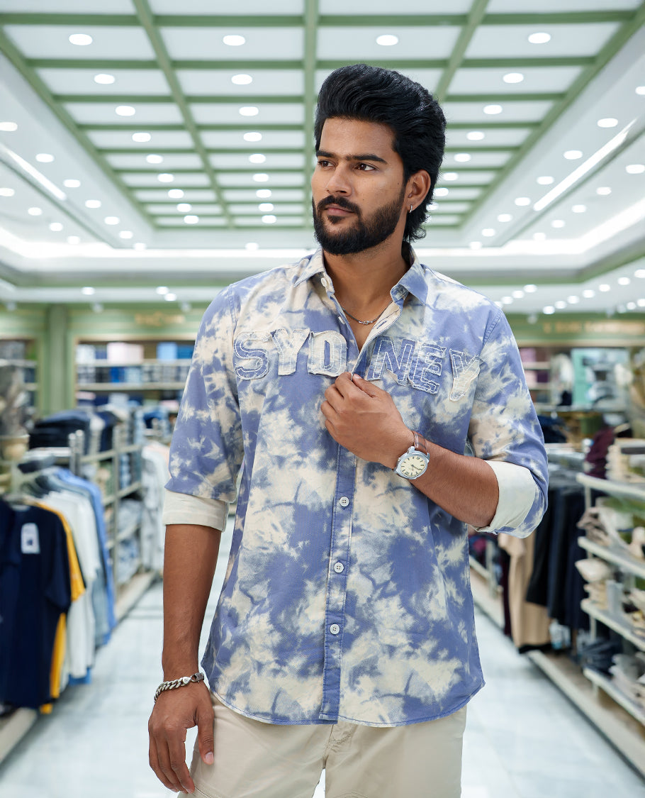 Blue Cotton Blended Casual Shirt, Adorned with Acid-Washed and Typography Patch Embroidery on the Chest, Featuring a Spread Collar, Full Sleeves, Slim Fit, and Regular Length
