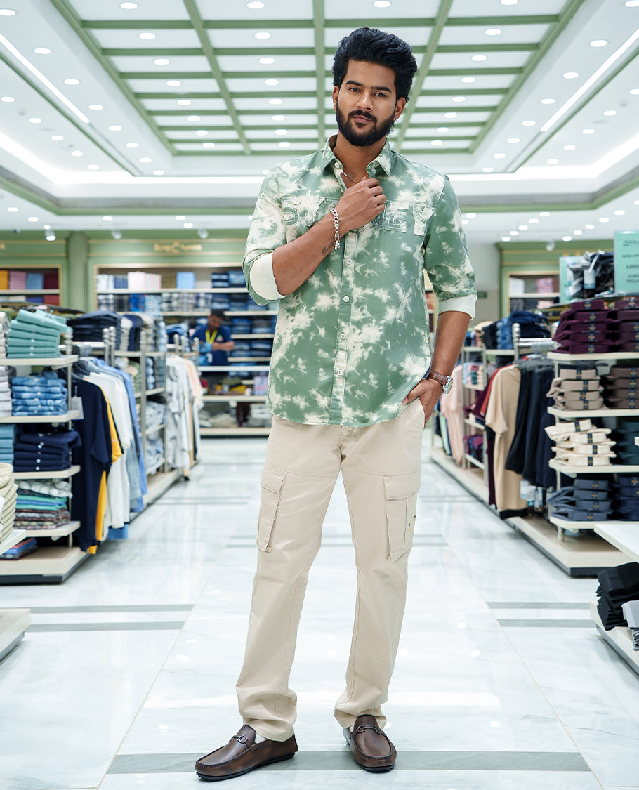 Green Cotton Blended Casual Shirt, Subtly Decked Up with Acid-Washed and Typography Patch Embroidery on the Chest, Featuring a Spread Collar, Full Sleeves, Slim Fit, and Regular Length
