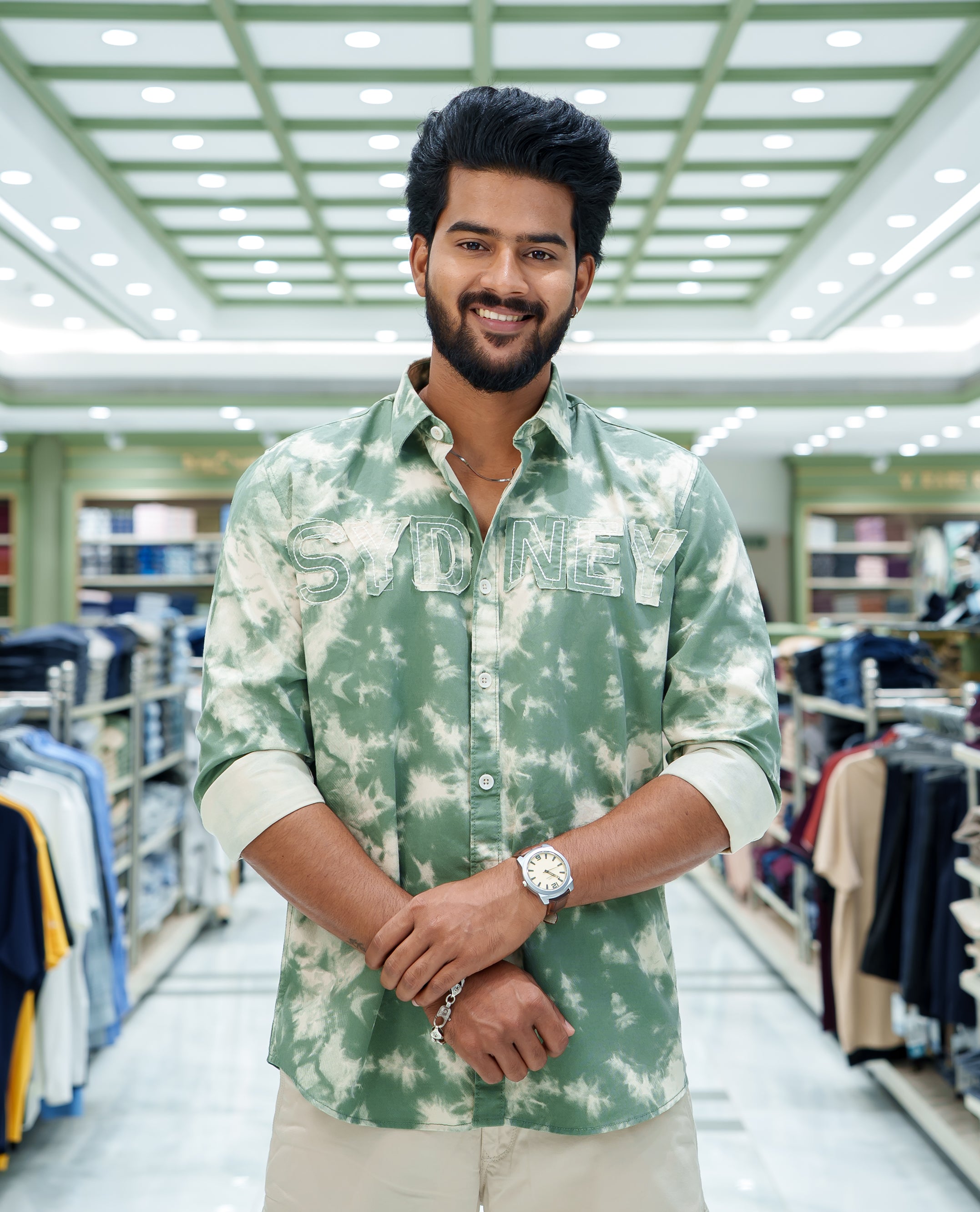Green Cotton Blended Casual Shirt, Subtly Decked Up with Acid-Washed and Typography Patch Embroidery on the Chest, Featuring a Spread Collar, Full Sleeves, Slim Fit, and Regular Length