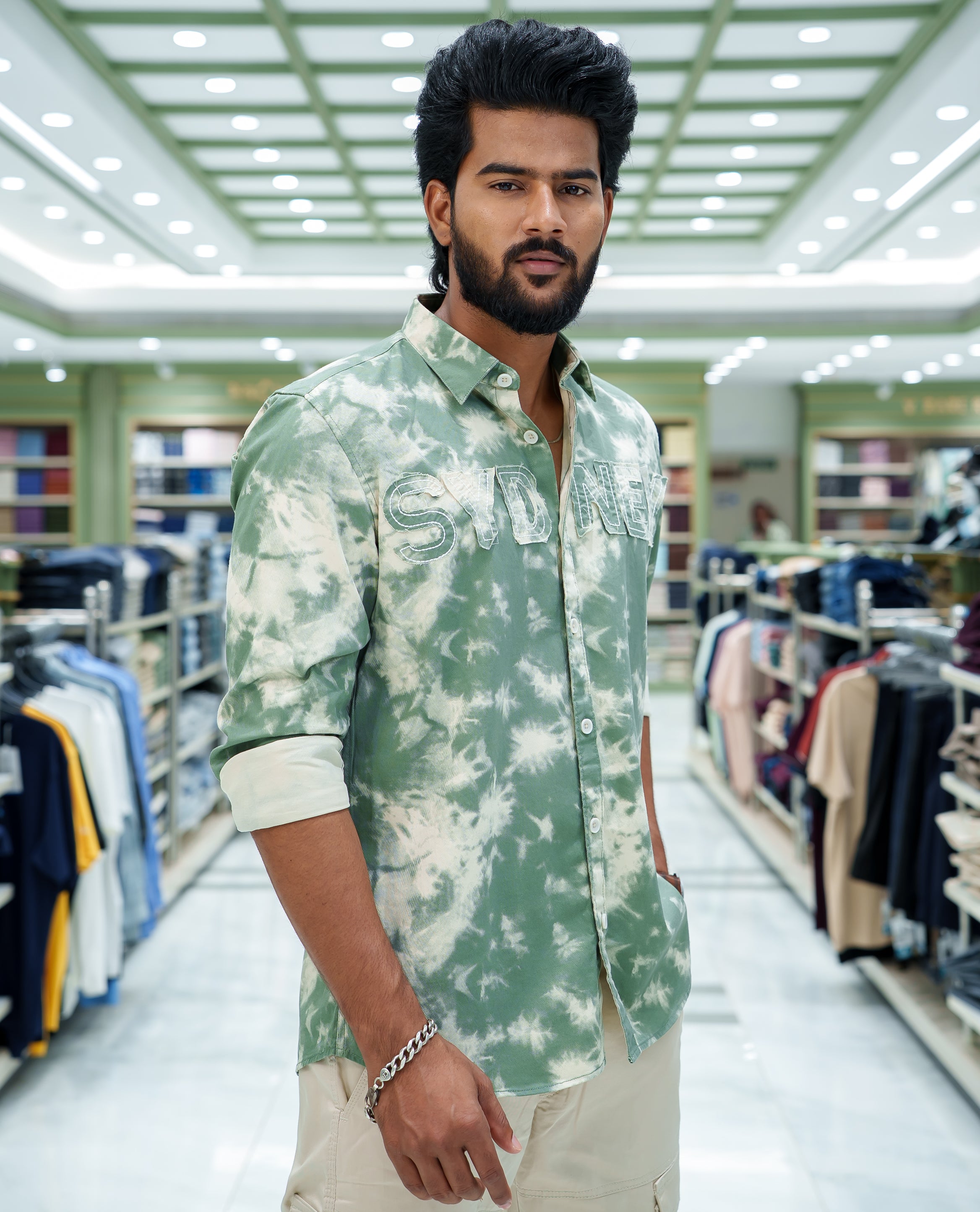 Green Cotton Blended Casual Shirt, Subtly Decked Up with Acid-Washed and Typography Patch Embroidery on the Chest, Featuring a Spread Collar, Full Sleeves, Slim Fit, and Regular Length