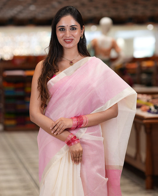 Cream Plain Nuni Cotton Saree, a Contrast Zari Border, Plain Pallu, and Contrast Blouse