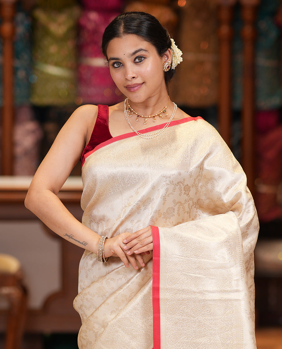Off-White-Red Semi-Silk Saree, Adorned with Floral Jacquard Design, a Zari Paisley Border, and a Contrast Blouse