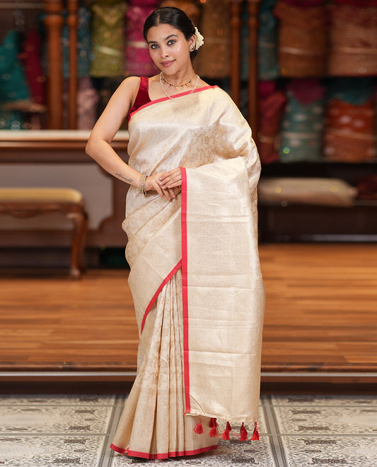 Off-White-Red Semi-Silk Saree, Adorned with Floral Jacquard Design, a Zari Paisley Border, and a Contrast Blouse