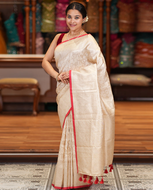 Off-White-Red Semi-Silk Saree, Adorned with Floral Jacquard Design, a Zari Paisley Border, and a Contrast Blouse