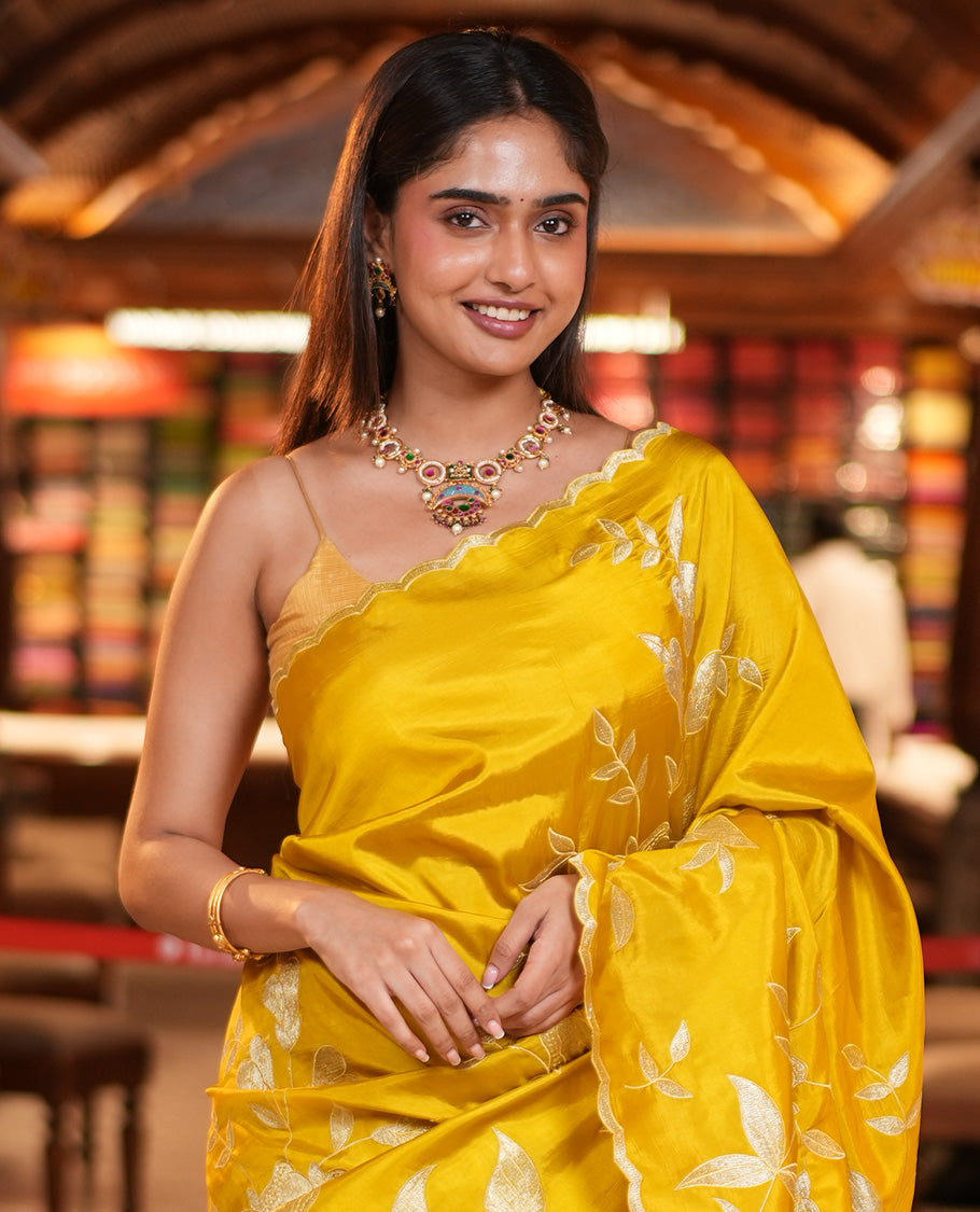 Mustard Yellow Dupion Silk Saree, Delicately Decked Up with Floral-Leaf Vine Embroidered On Its Body, Subtle Scallop Border, Artfully Floral Embroidered Pallu, and Paired with a Plain Blouse