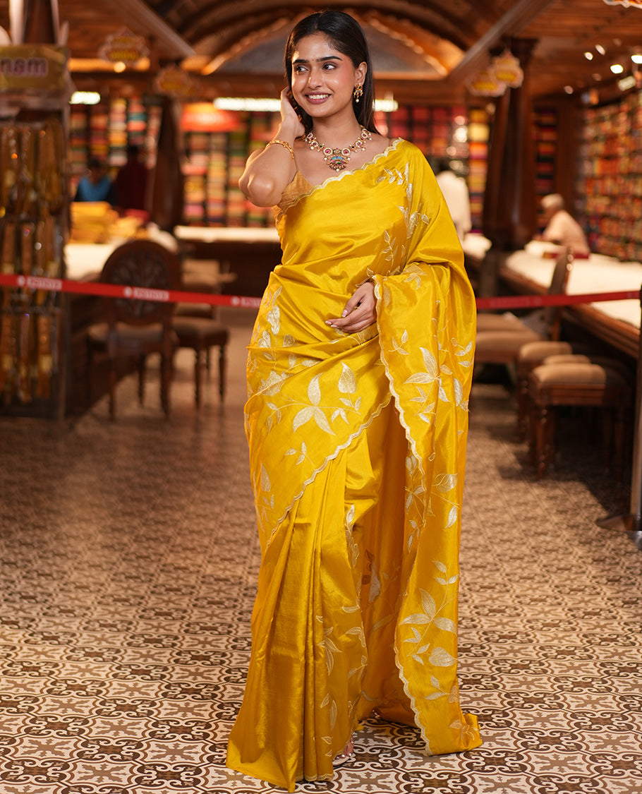 Mustard Yellow Dupion Silk Saree, Delicately Decked Up with Floral-Leaf Vine Embroidered On Its Body, Subtle Scallop Border, Artfully Floral Embroidered Pallu, and Paired with a Plain Blouse