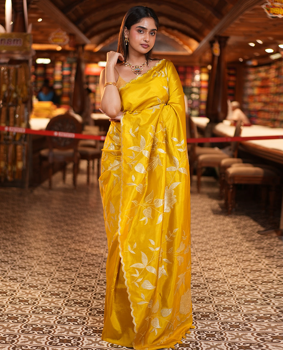 Mustard Yellow Dupion Silk Saree, Delicately Decked Up with Floral-Leaf Vine Embroidered On Its Body, Subtle Scallop Border, Artfully Floral Embroidered Pallu, and Paired with a Plain Blouse