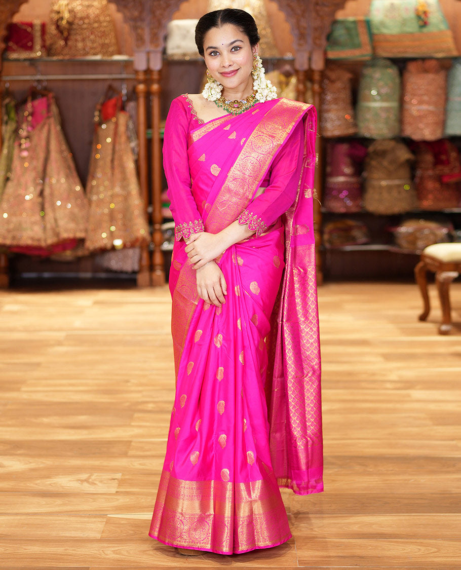 Pink Budget Silk Saree Bedecked with Paisley Buttas All Over Its Body, Highlighted by a Traditional Zari Design Border, Grand Pallu of Jaal Designs, and Paired with a Matching Blouse
