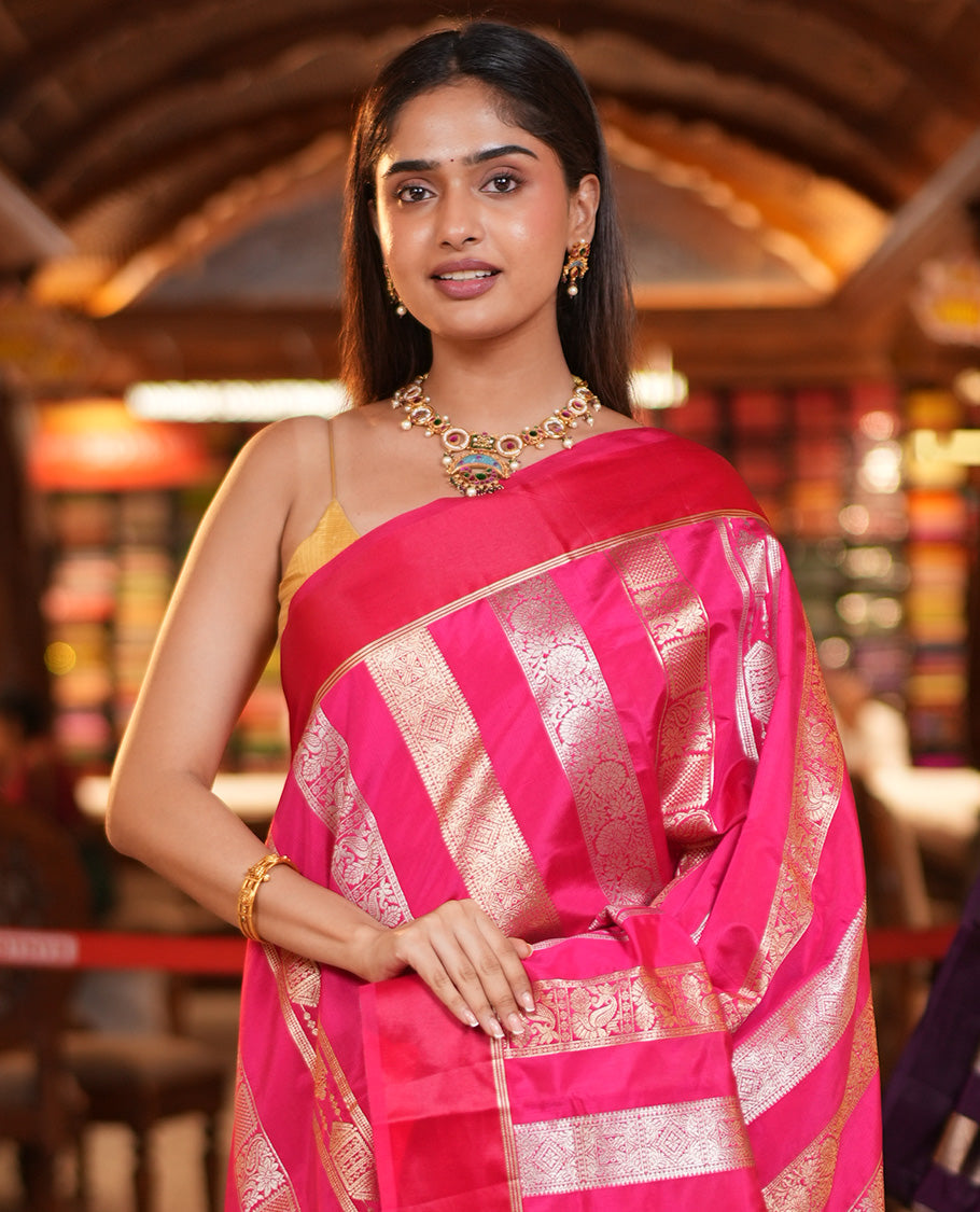 Rani Pink Dupion Silk Saree, Richly Features Vertically Woven Traditional Patterns in Zari, Complemented by Contrast Zari Satin Border, Rich Pallu, and Paired with a Matching Blouse