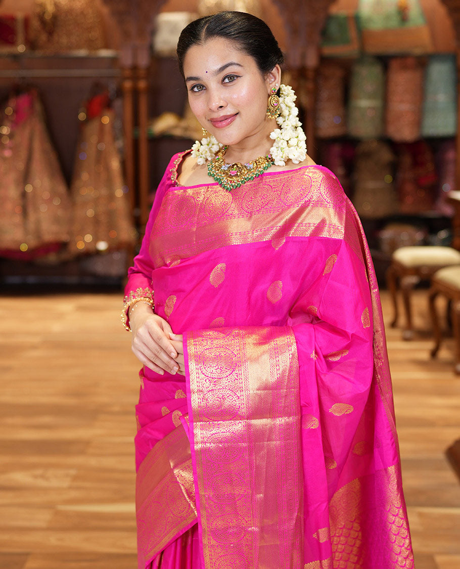 Pink Budget Silk Saree Bedecked with Paisley Buttas All Over Its Body, Highlighted by a Traditional Zari Design Border, Grand Pallu of Jaal Designs, and Paired with a Matching Blouse