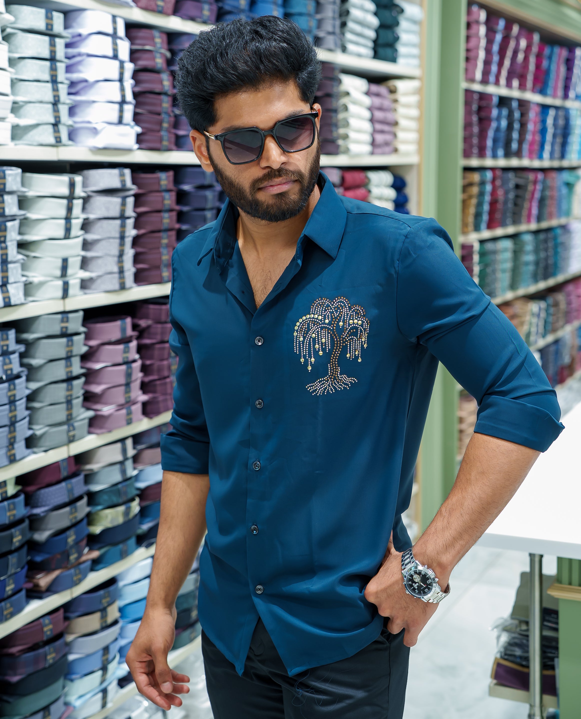 Peacock Blue Poly Blended Party Wear Shirt, Decorated with Tree-Motif Embroidery, Featuring a Spread Collar, Full Sleeves, Slim Fit, and Regular Length