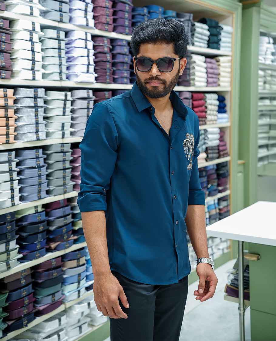 Peacock Blue Poly Blended Party Wear Shirt, Decorated with Tree-Motif Embroidery, Featuring a Spread Collar, Full Sleeves, Slim Fit, and Regular Length