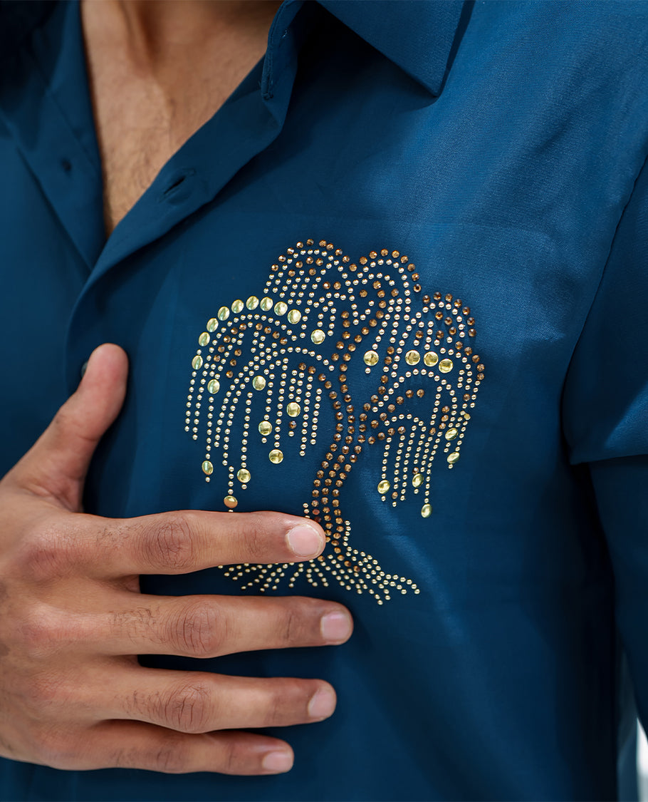 Peacock Blue Poly Blended Party Wear Shirt, Decorated with Tree-Motif Embroidery, Featuring a Spread Collar, Full Sleeves, Slim Fit, and Regular Length