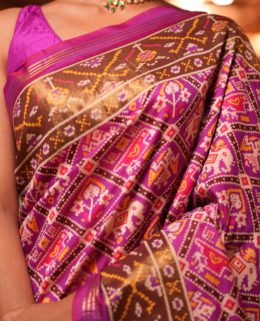 Purple Intricate Motif Semi-Patan Patola Saree, Patola Printed Tissue Border, and a Matching Blouse