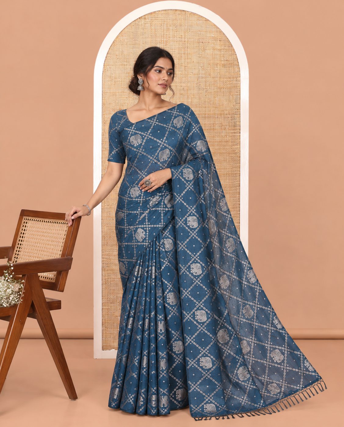 Borderless Blue Vichitra Silk Saree Features Elephant Butta Enclosed Jaal Design, a Self-Pallu, and No Blouse