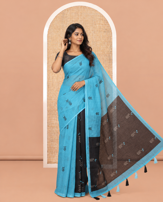 Borderless Blue Linen Cotton Saree with Leaf Print, a Contrast Leaf-Printed Pallu, and Contrast Blouse