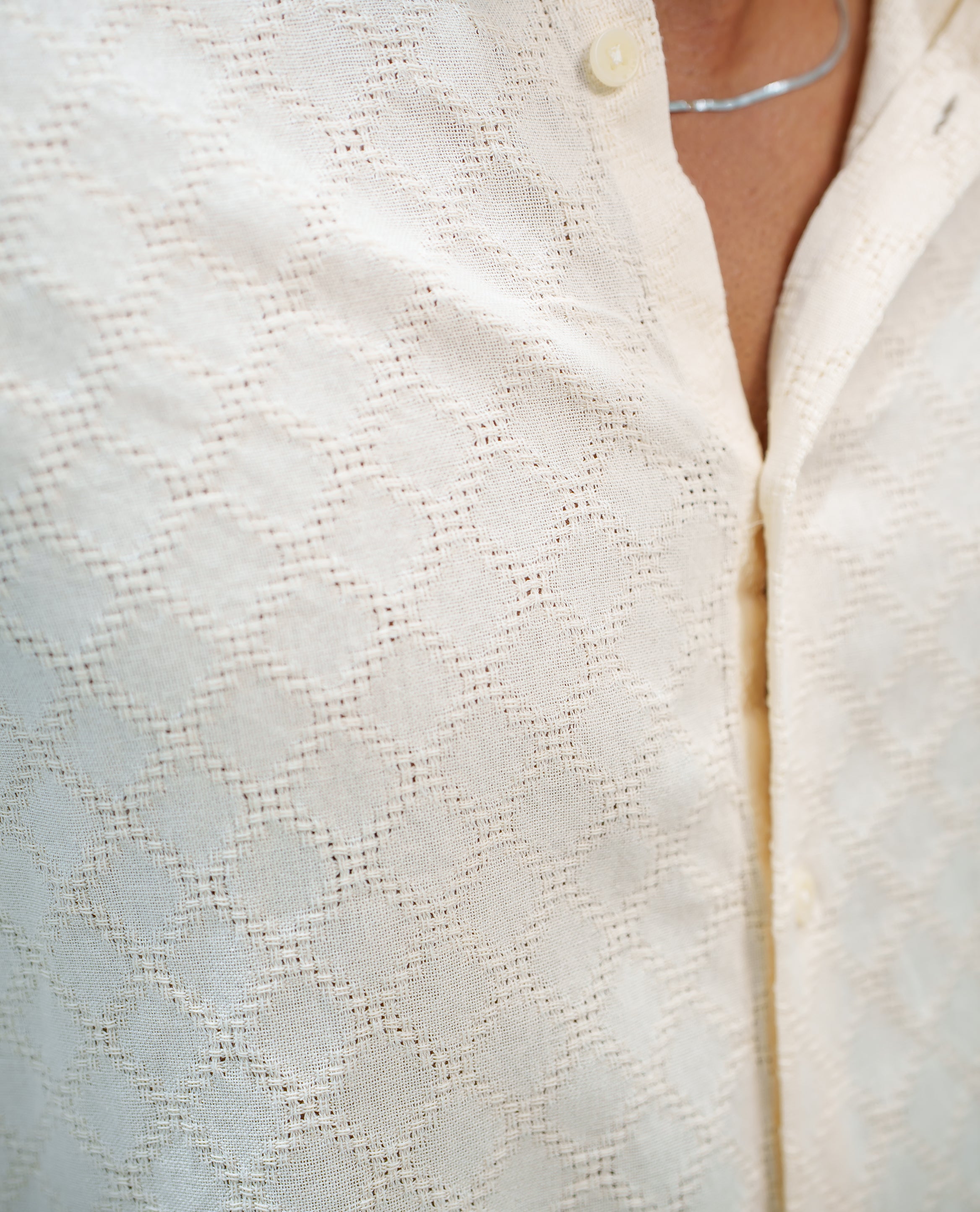 Cream Cotton Blended Casual Shirt, Subtly Sparkled with Diamond-Patterns Texture, Featuring a Mandarin Collar, Full Sleeves, Slim Fit, and Regular Length
