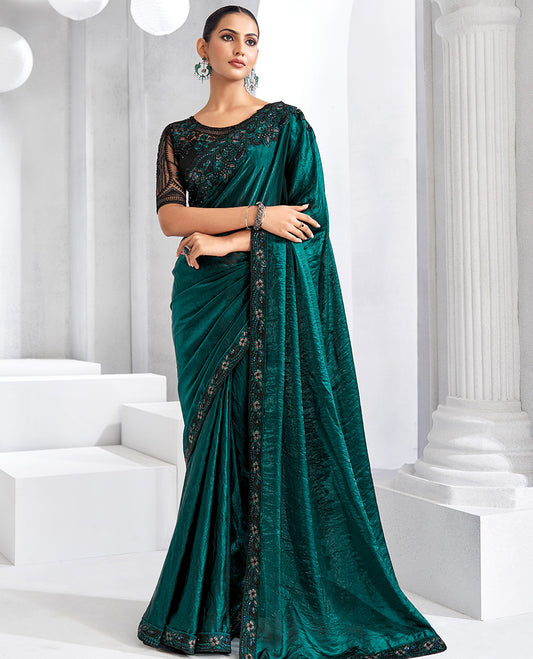 Peacock green plain designer saree, scallop intricately embroidered border, and self-pallu