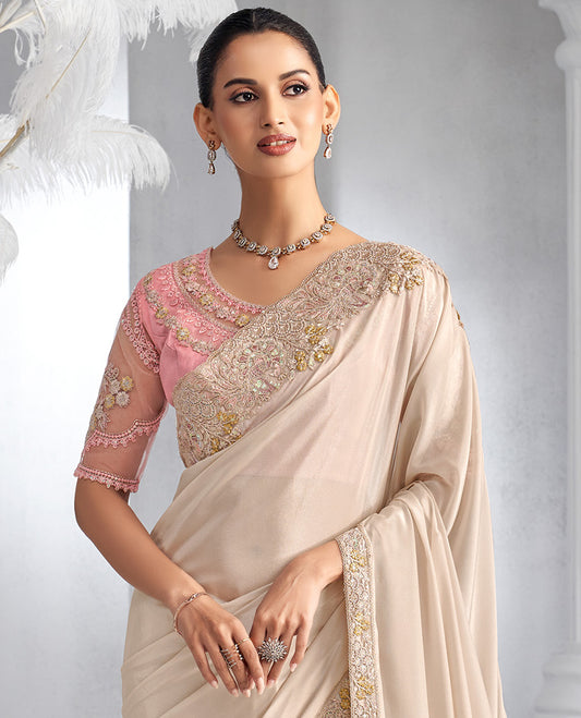 Pearl white plain designer saree, floral theme embroidered border, and self-pallu