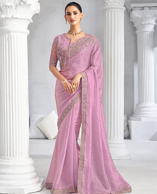 Pastel Pink plain designer saree, scallop floral embroidered border, self-pallu, and a heavy embroidered jacket blouse