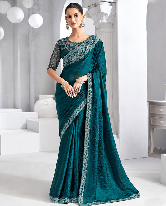 Peacock blue plain designer saree, floral scallop embroidered border, and self-pallu