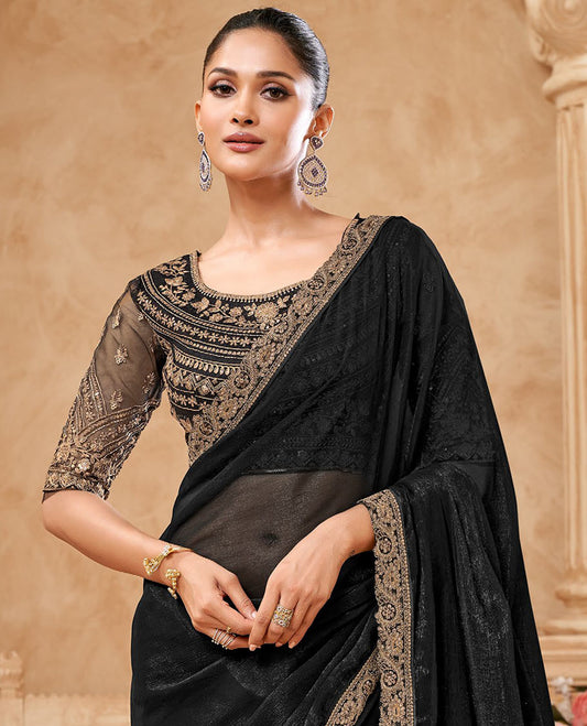 Black crushed designer saree, scallop embroidered border, and embroidered blouse