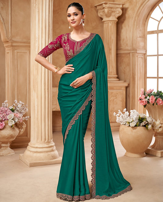 Bottle green plain designer saree, scallop embroidered border, and contrast embroidered blouse