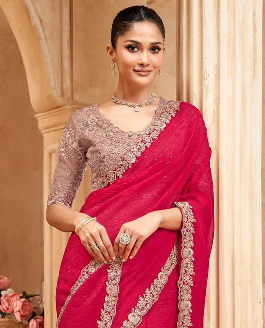 Pink crushed designer saree, scallop embroidered border, and contrast embroidered blouse