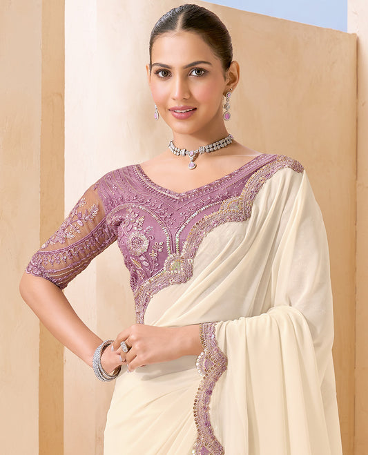 Cream Plain Designer Saree, Scallop Embroidered Border, a Self-Pallu, and Paired with a Contrast Intricately Embroidered Blouse
