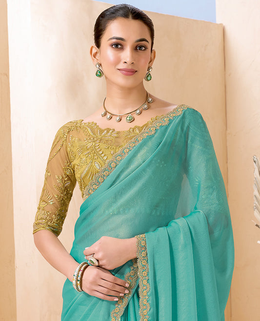 Turquoise Plain Designer Saree, Scallop Embroidered Border, a Self-Pallu, and Paired with a Contrast Intricately Embroidered Blouse