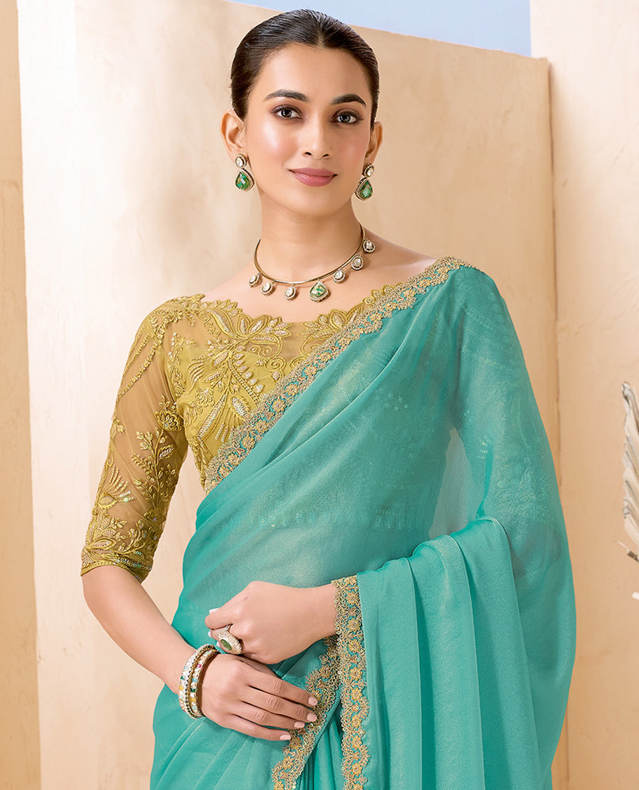 Turquoise Plain Designer Saree, Scallop Embroidered Border, a Self-Pallu, and Paired with a Contrast Intricately Embroidered Blouse