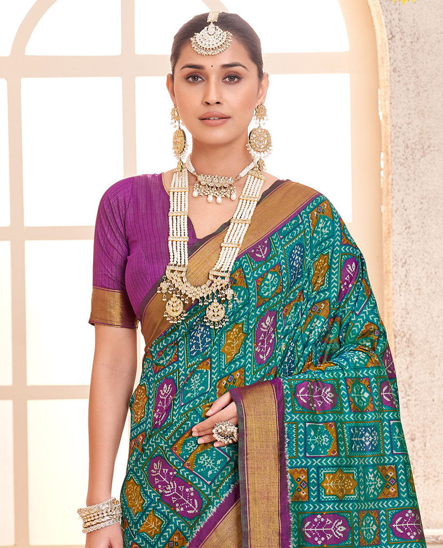 Blue Patola Fancy Raw Silk Designer Saree, Enthralled with Intricate Design, a Bavanji Border, Intricately Designed Pallu, and a Contrast Blouse