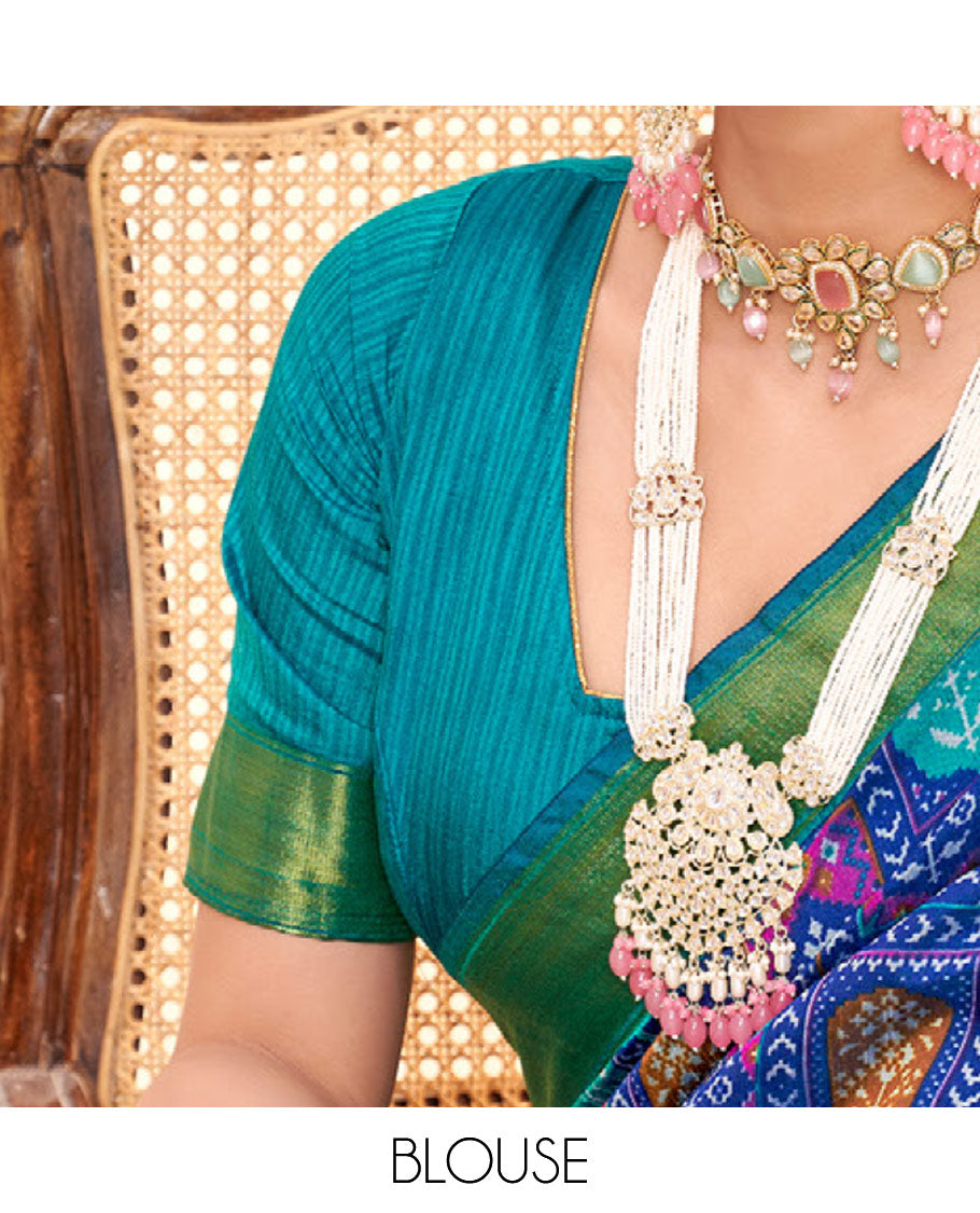 Blue Patola Fancy Raw Silk Designer Saree, Accentuated with Intricate Design, a Bavanji Border, Intricately Designed Pallu, and a Contrast Blouse