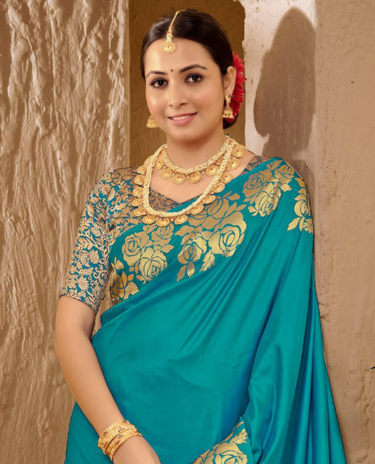Blue Art Silk Plain Designer Catalog Saree, Enthralled with a Rose Zari Border, Pallu of Floral Designs, and a Matching Blouse