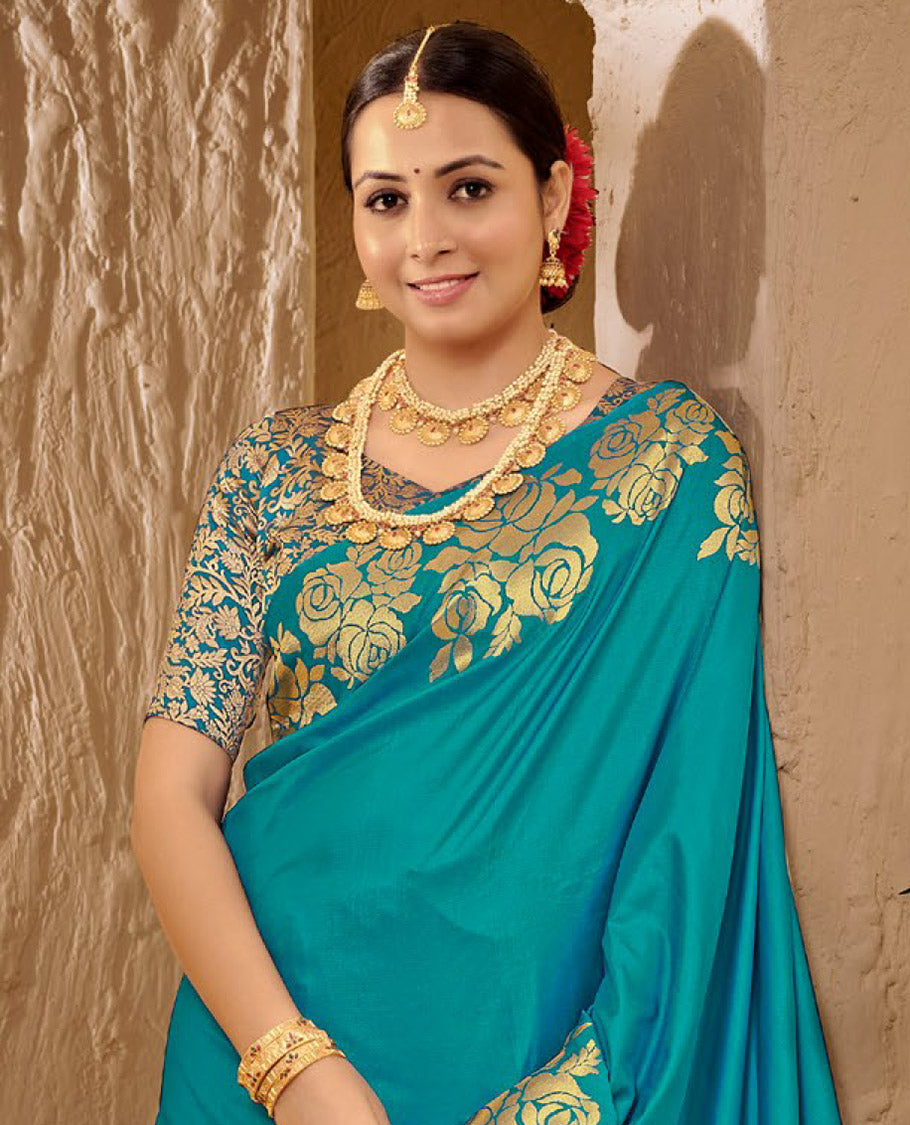 Blue Art Silk Plain Designer Catalog Saree, Enthralled with a Rose Zari Border, Pallu of Floral Designs, and a Matching Blouse