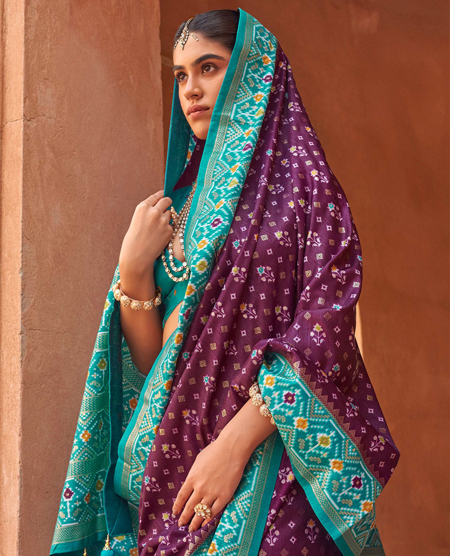 Purple Ikat Patola Designer Saree, Embellished with Floral Ikat Buttas, Complemented by a Contrast Ikat Border, Intricate Pallu, and a Contrast Blouse