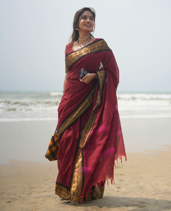 Maroon Plain Chettinad Cotton Saree, Complemented by a Contrast Rudraksham Design Traditional Zari  Border, Subtly Striped Pallu, and Paired with a Matching Blouse