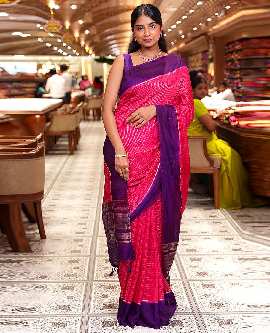 Pink Assam Silk Saree, Gleamed Up with Zari Checked Design on Its Body, Complemented by Contrast Border, Pallu Steeped with Gleaming Zari Stripes, and Paired with a Contrast Blouse