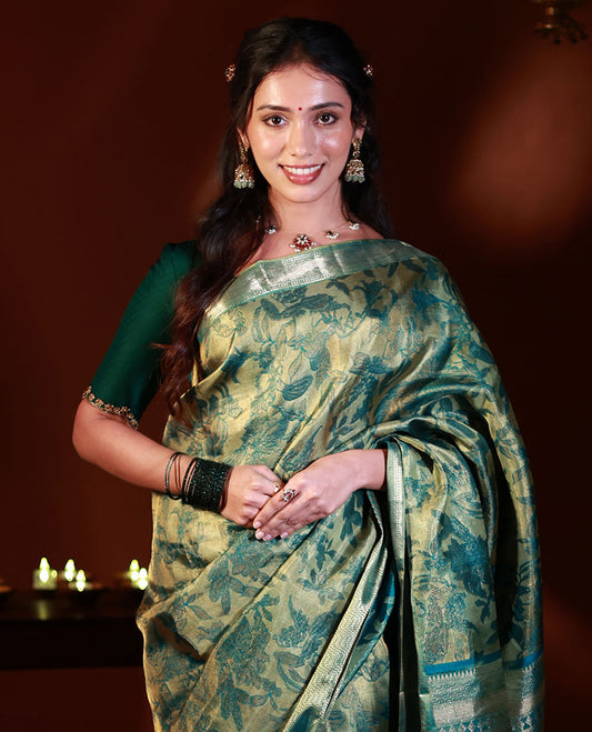 Green floral brocade Kanchipuram silk saree, zari border and pallu steeped with geometric patterns