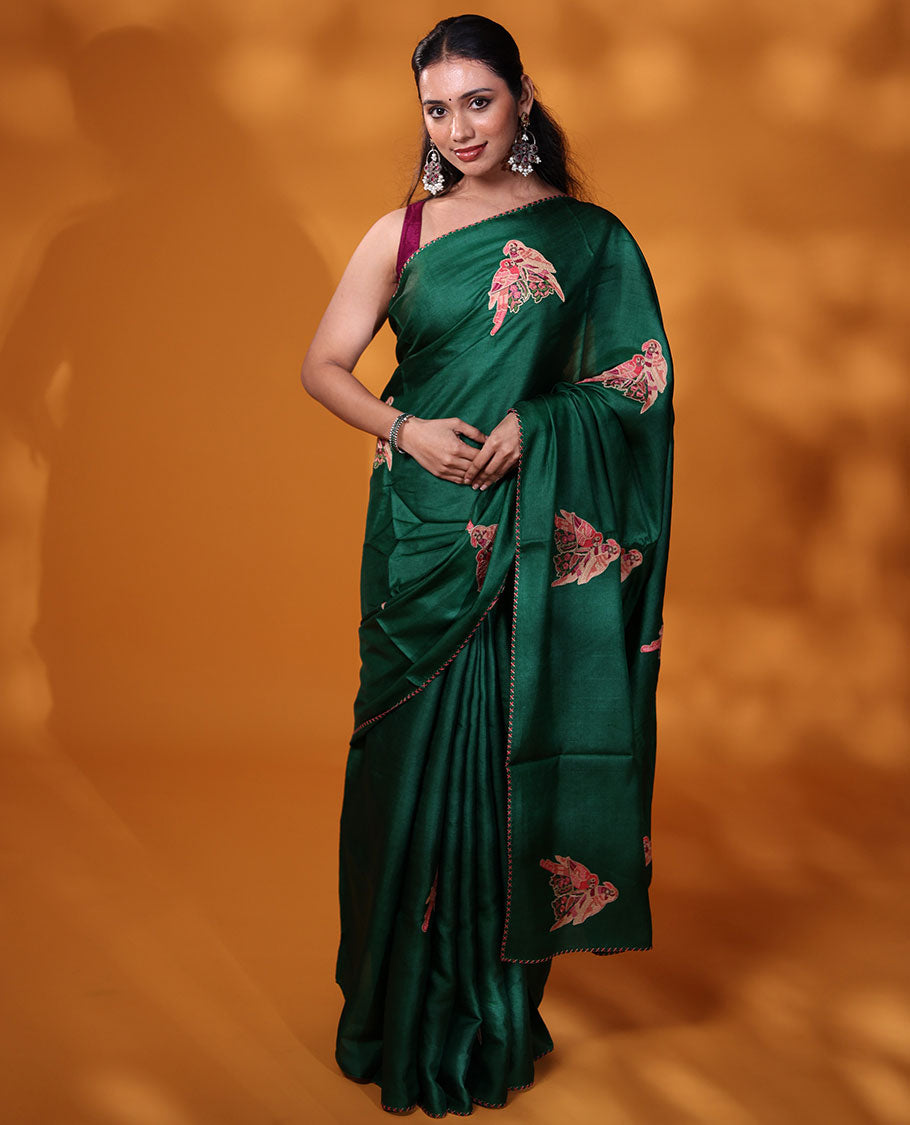 Borderless dark green macaw parrot motifs multi-colored thread embroidered tussar saree
