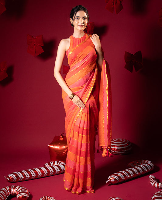 Orange rainbow-style striped Khadi mul cotton saree with piping zari border, and a matching zari striped blouse