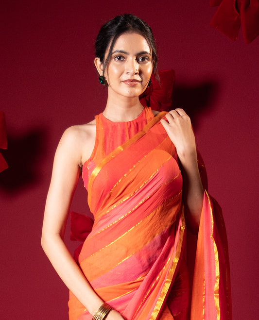 Orange rainbow-style striped Khadi mul cotton saree with piping zari border, and a matching zari striped blouse