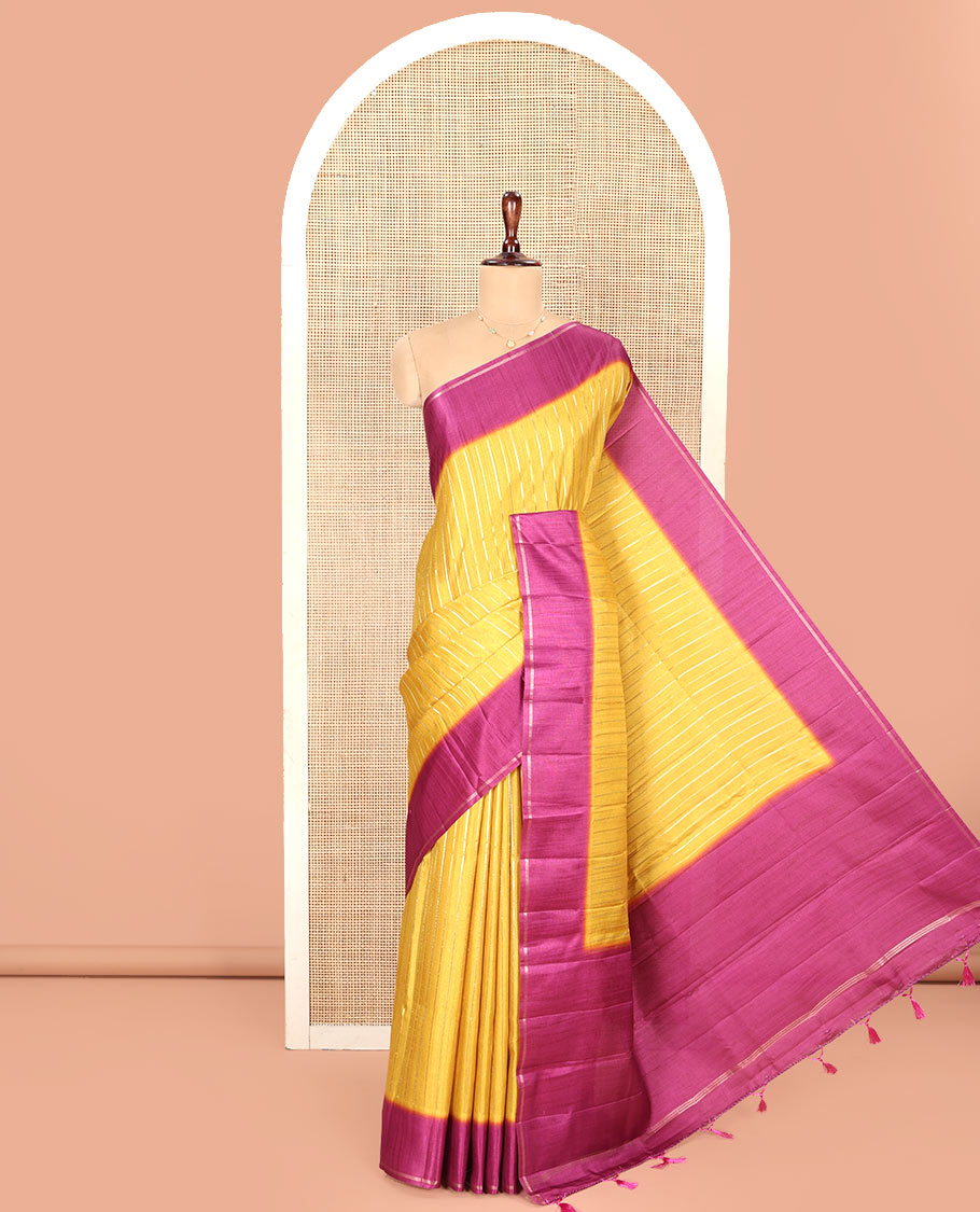 Mustard Fancy Tussar Saree, Highlighted by Vertical Zari Stripes Across Its Body, Complemented by Captivating Contrast Geometric Patterned Border, Subtle Pallu and Paired with a Contrast Blouse
