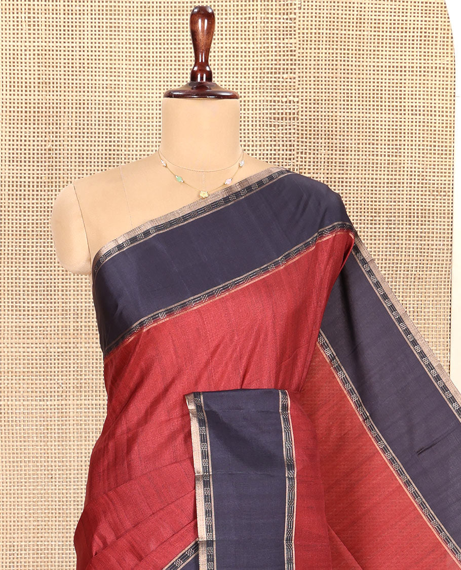 Maroon Plain Semi-Tussar Silk Saree, Complemented by a Contrast Geometric Design Border, Subtly Zari Striped Pallu, and Paired with a Contrast Floral Vine Printed Blouse