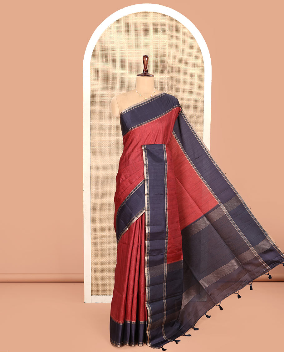 Maroon Plain Semi-Tussar Silk Saree, Complemented by a Contrast Geometric Design Border, Subtly Zari Striped Pallu, and Paired with a Contrast Floral Vine Printed Blouse