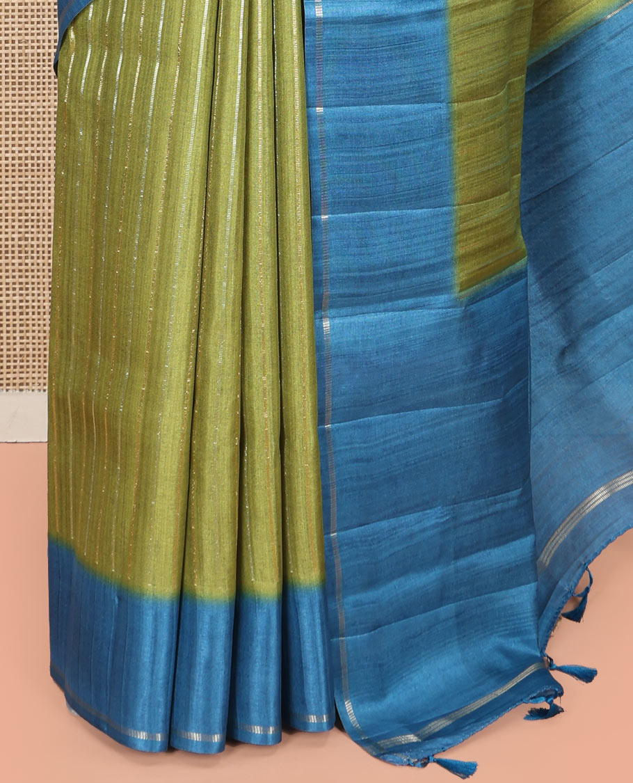 Pista Green Fancy Tussar Saree, Highlighted by Vertical Zari Stripes Across Its Body, Complemented by Captivating Contrast Geometric Patterned Border, Subtle Pallu and Paired with a Contrast Blouse