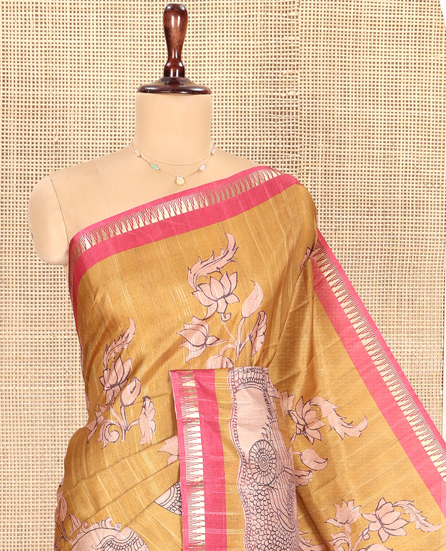 Mustard Semi-Tussar Silk Saree, Elegantly Detailed with Kalamkari-Style Human Motifs Printed on Its Body, Complemented by a Contrast Temple Zari Border, Creatively Kalamkari Printed Pallu, and Paired with a Contrast Blouse