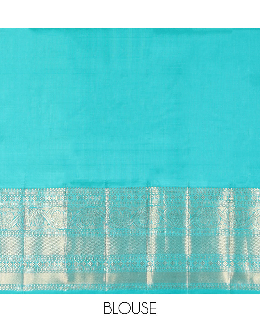 Blue Vasundhara Silk Saree Adorned with Jacquard Design Weave All Over Its Body, Complemented by a Contrast Border of Rekku, Muthu, Laddu Kamalam, Then Kuli Kann, and Dhavana Kodi Designs, Artfully Zari Woven Pallu, and Paired with a Contrast Blouse